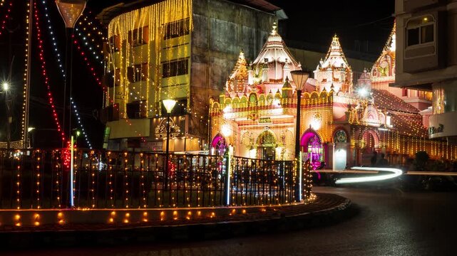 4k Timelapse footage of lit up Mapusa city in Goa at night with traffic light trails