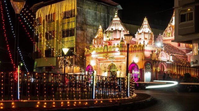 4k Timelapse footage of lit up Mapusa city in Goa at night with traffic light trails
