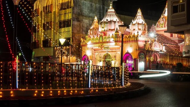 4k Timelapse footage of lit up Mapusa city in Goa at night with traffic light trails