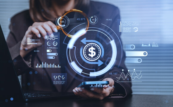 Business professional interacting with futuristic financial inte