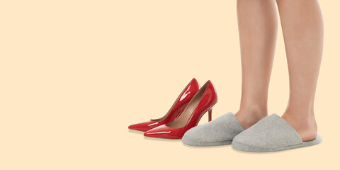 Naklejka premium A woman displays high heels and slippers