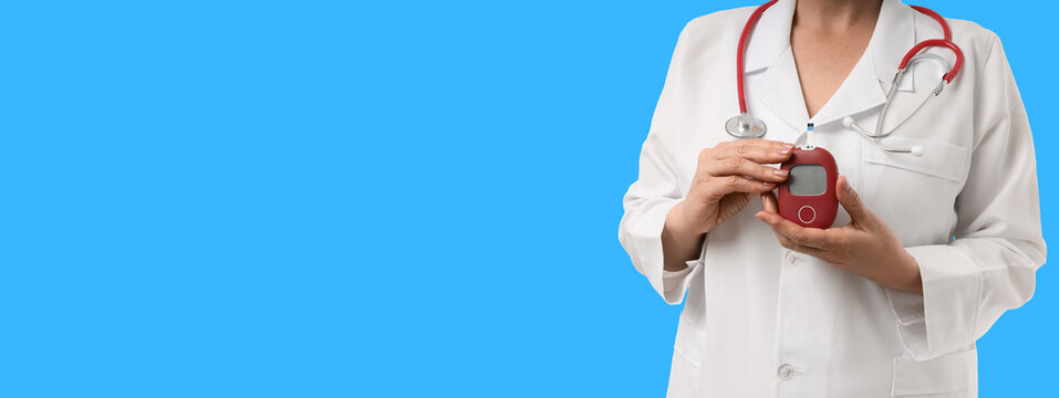 Health expert demonstrates a digital monitor in a clinical setting