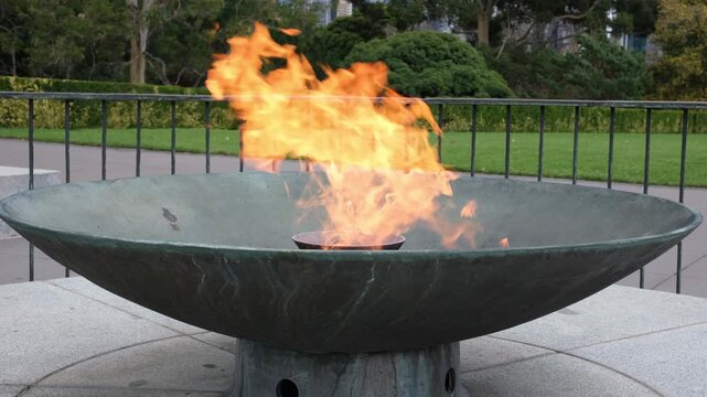 The eternal flame burning in a large bronze bowl at the Shrine of Remembrance, Melbourne, Victoria, Australia.&nbsp;Symbolising memorial and honour for fallen soldiers.