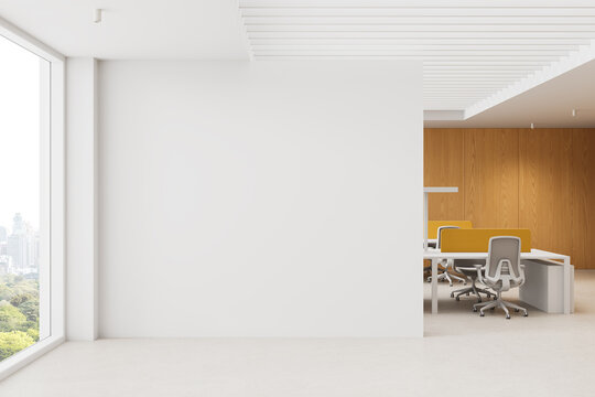 Empty white wall mockup in modern architecture interior featuring open workspace, wooden panels and wide city view, ideal for poster or template display. 3D Rendering