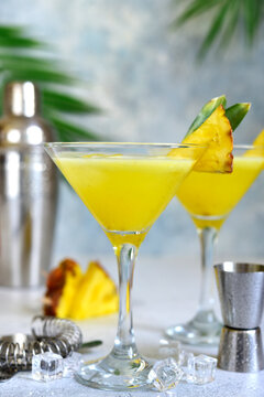 Pineapple cosmopolitan cocktail in a glasses.