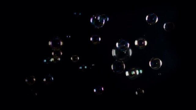Animated bubbles on a black background.