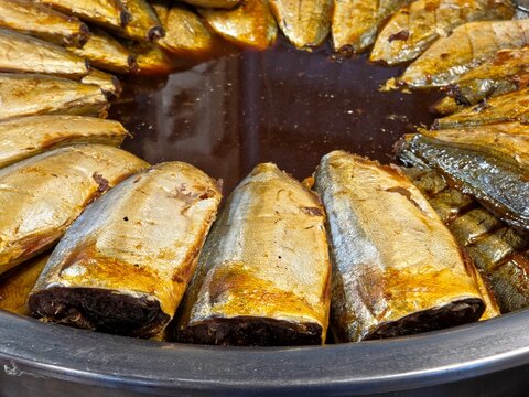 Thai Braised Mackerel (Pla Too Kem) Simmering in a Sweet and Savory Sauce at a Street Food Market