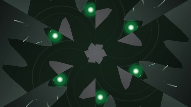 Green lights shine on geometric shapes in a dark abstract design