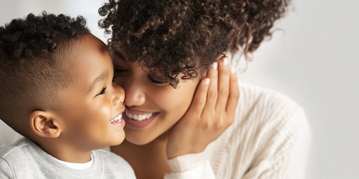 Mother and child share a tender moment, close-up of loving embrace