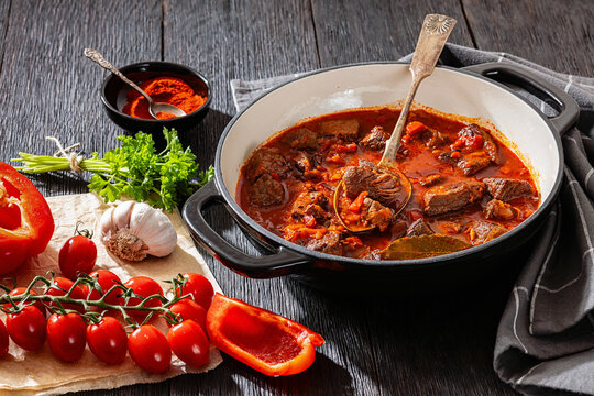 Beef goulash stew with paprika in ceramic pot