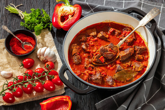 Beef goulash stew with paprika in ceramic pot