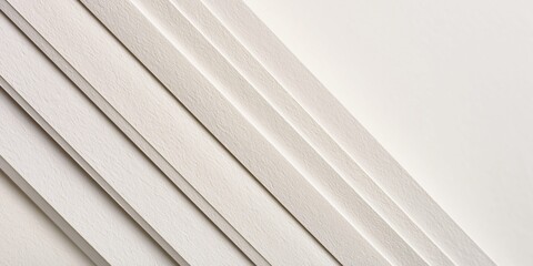 Obraz premium Textured paper layers create a subtle, elegant diagonal background pattern