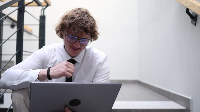Dedicated office worker continues working on laptop after hours improving skills and planning self growth focused mindset determination quiet space away from busy workplace