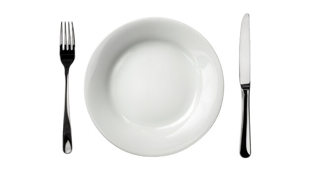 White ceramic plate with polished metal fork and knife, isolated on transparent background