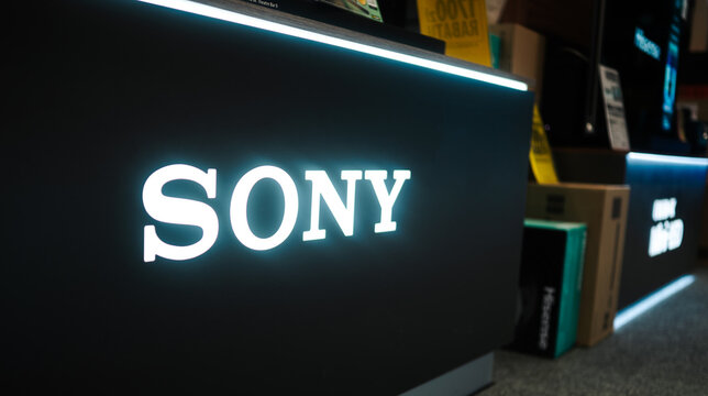 Poznan, Poland - 26 July 2025: Gleaming Sony logo on dark retail electronics display