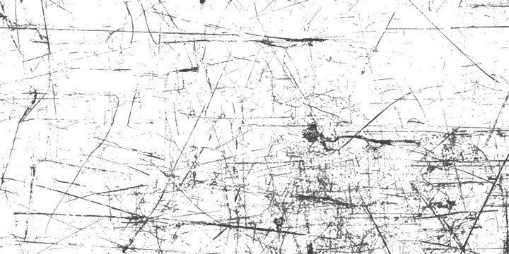 Black grunge scratches and distressed texture pattern on a flat surface