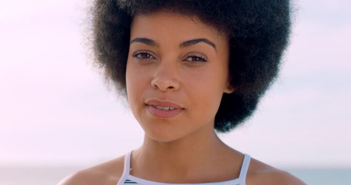 Smile, travel and face of woman by beach for summer vacation, holiday or weekend trip with calm. Outdoor, peace and portrait of female person by ocean for seaside getaway in Brazil for break.