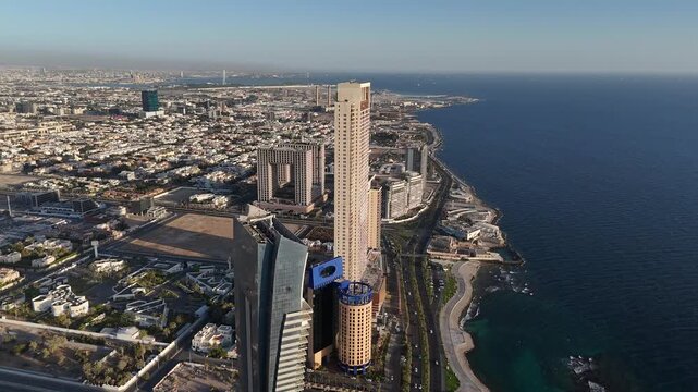 Jeddah Skyline & Waterfront Aerial 4K: Modern Bride of the Red Sea. A Symbol of Saudi Vision 2030, Progress & Prosperity for National Day, Founding Day & Expo 2030.