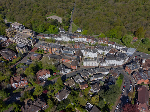 Above historic Pantiles near Tunbridge Wells in Kent,UK. Aerial view of small tourist town with old buildings and town square. Popular street with restaurants, shops and accommodation.