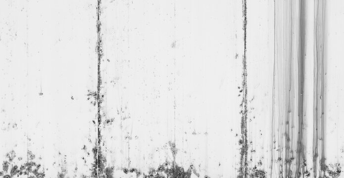 Full frame texture of a weathered white concrete wall with grunge stains, vertical water streaks, and industrial rust spots. Monochrome Background Pattern.