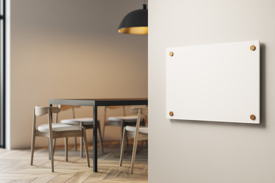 Blank wall sign mockup in a modern office interior featuring clean empty design space and soft light for corporate branding display purposes. 3D Rendering