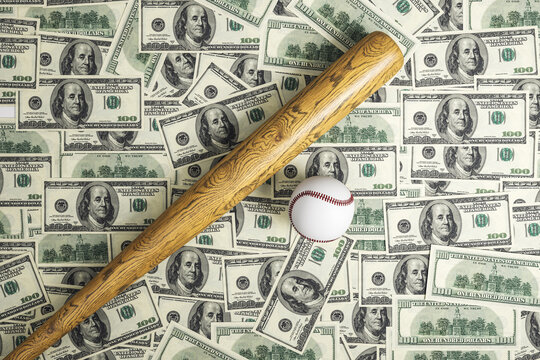 Baseball bat and ball placed over scattered hundred dollar bills symbolizing sports betting and financial stakes in a dramatic composition. 3D Rendering