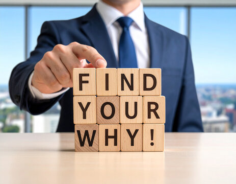 Find your why! - Geschäftsmann zeigt auf den Text "Find your why!"