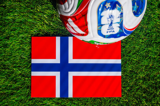 ATLANTA, USA, APRIL 21, 2026: Norway National Flag and Official FIFA 2026 Soccer Ball on Green Turf. World Cup Background.