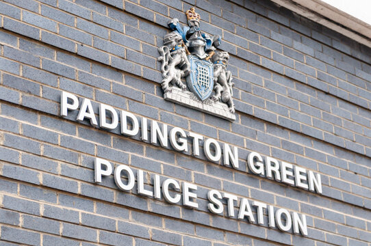 The imposing concrete brutalist facade of Paddington Green Metropolitan Police Station in West London, known for its high-security features and role as a major law enforcement hub.
