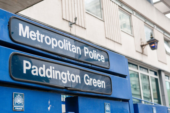 The imposing concrete brutalist facade of Paddington Green Metropolitan Police Station in West London, known for its high-security features and role as a major law enforcement hub.