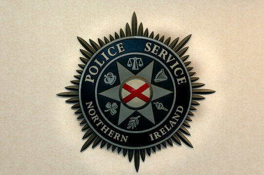 Police Service of Northern Ireland emblem on an interior wall at police headquarters in Belfast, Northern Ireland