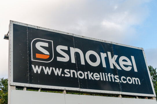 Industrial vertical signage outside the Snorkel Lifts manufacturing facility