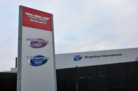 Signage and corporate branding outside the Wrightbus manufacturing headquarters in Ballymena, Northern Ireland, a global leader in zero-emission bus technology