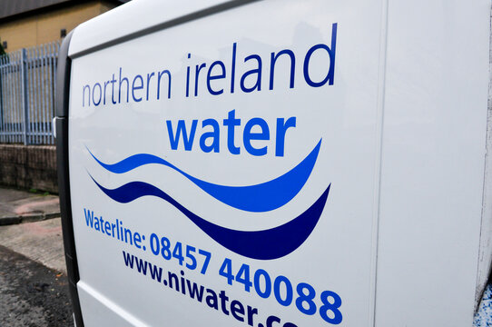 A Northern Ireland Water utility van performing essential maintenance duties, featuring the company's distinctive branding, Northern Ireland.