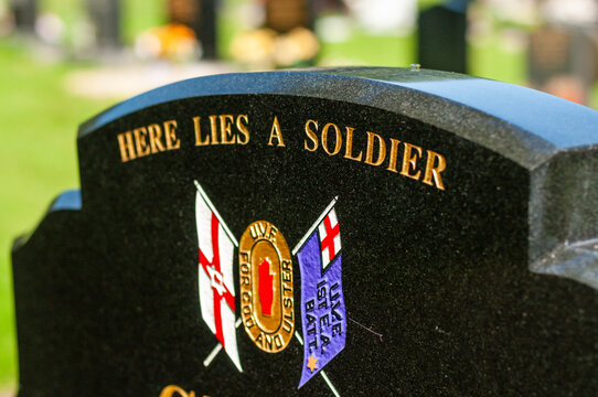 "Here lies a soldier" inscription on a gravestone of a UVF member killed during the troubles.