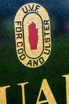 Gravestone of a Ulster Volunteer Force member showing the Red Hand of Ulster and the UVF slogan "For God and Ulster"