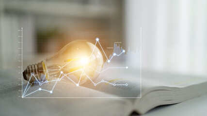 A glowing light bulb sits on an open book, symbolizing creativity and innovation, accompanied by data graphs that illustrate growth and potential in knowledge and ideas. Scalp © InfiniteFlow