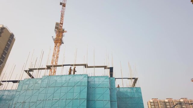 Construction Workers Building High-Rise Residential Project in Beijing, China