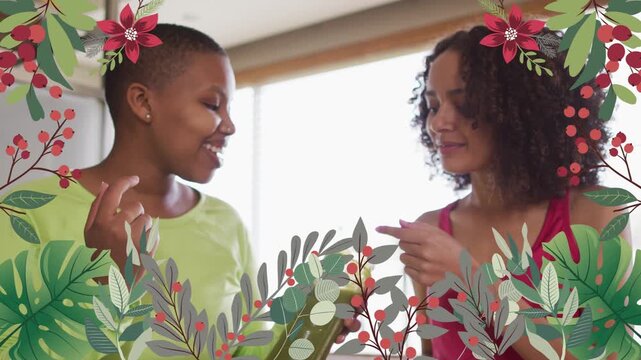 Two women trying green smoothie food demo right woman pointing then dipping finger floral framing