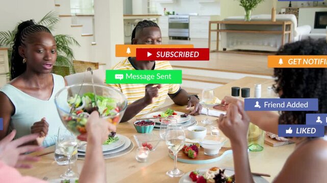 Four diners passing salad, play icon popping social-media engagement alerts across table, resuming