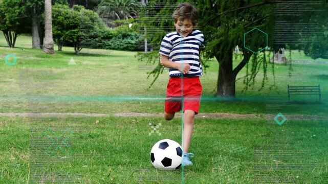 Boy spotting soccer ball, running, kicking while training, following ball under teal HUD for sports