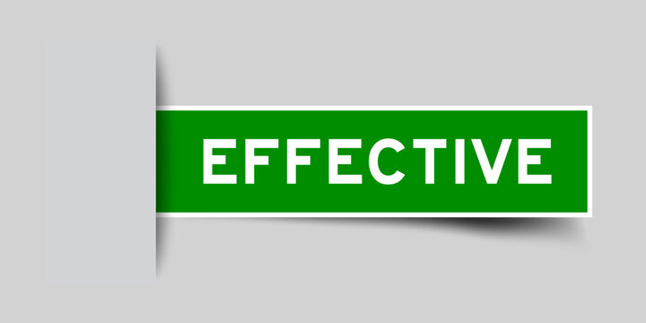 Green color square shape sticker label with word effective inserted in gray background
