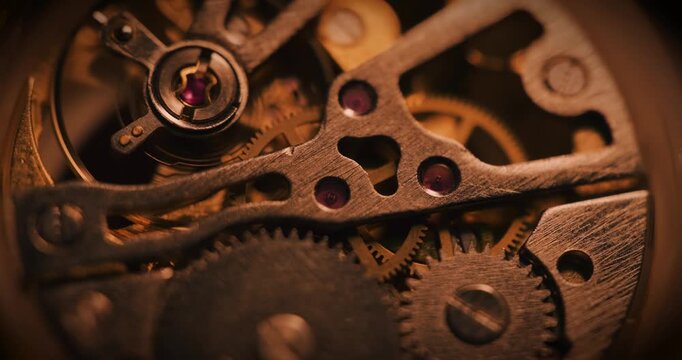 Close up of mechanical cogs and gears turning