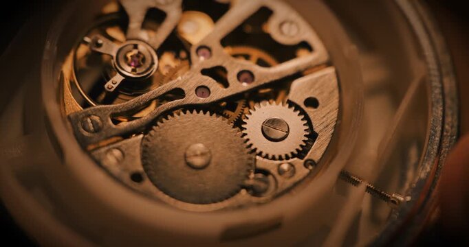 Close up of mechanical cogs and gears turning