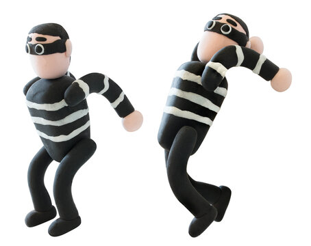 Handmade clay thief character in jumping pose, isolated on white background, representing action, crime concept, and playful storytelling.