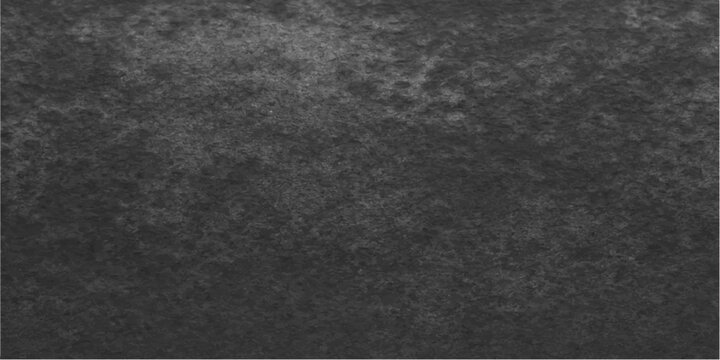 Black asphalt texture background with dark rough surface and subtle black and white pattern suitable for wallpaper and design