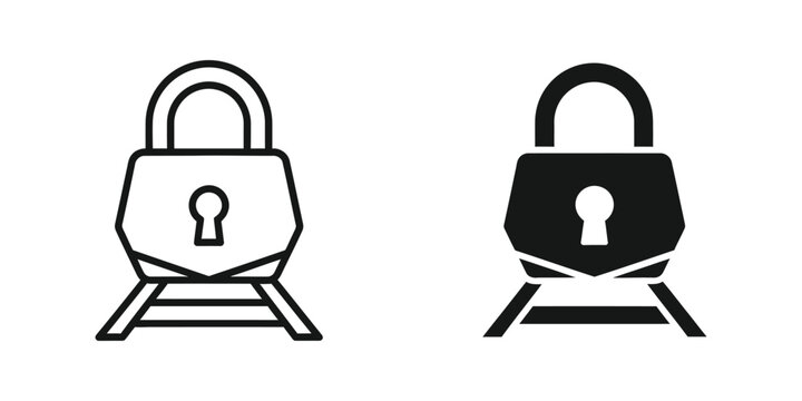 Locked padlocks on train tracks symbolizing security and protection