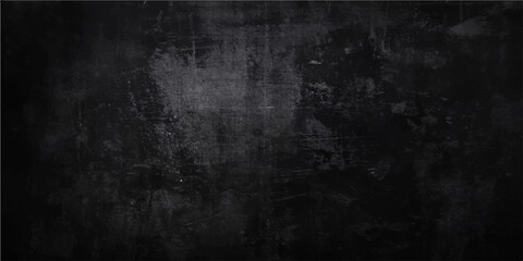 Obraz premium A dark vintage grunge wall background features an aged concrete texture with a black paper pattern on a dirty gray stone surface backdrop
