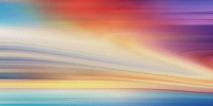 Abstract light streaks and motion blur with vibrant colors red orange yellow blue purple.