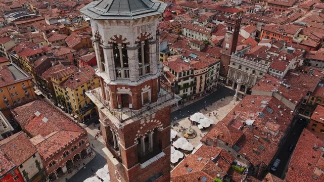 Aerial Drone View of Piazza delle Erbe in Verona, Italy . Historic Market Square, Medieval Architecture and Panoramic Old Town Cityscape